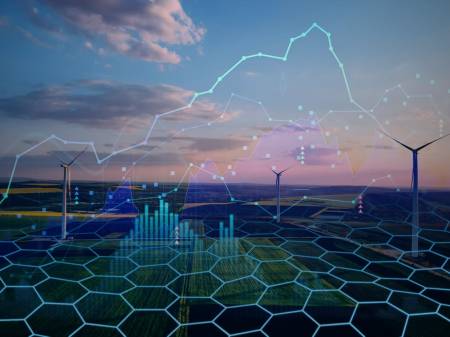 Landschaftsaufnahme mit Windrädern überlagert von grafischen Elementen